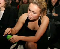 Hayden Panettiere wearing a low-cut black dress.