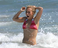 Hayden Panettiere playing around in the water.