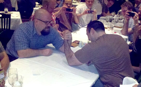 Jason Dean beat Ben Nadel in an arm wrestling match at cf.Objective() 2011.